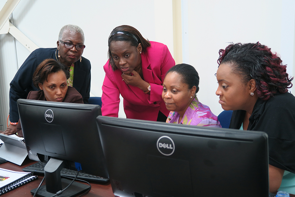 Teacher helping students
